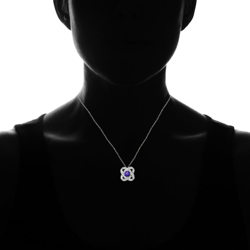 Sterling Silver Created Blue Sapphire And White Topaz Love Knot Necklace